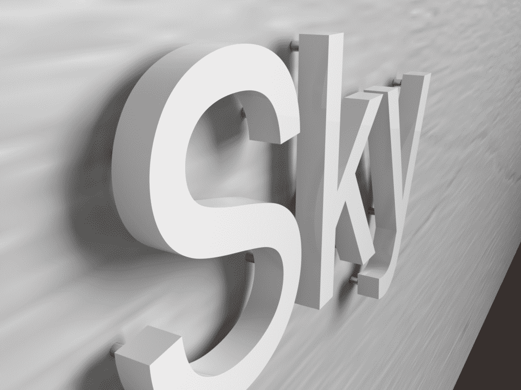 Skyltprofiler där bokstäver fäst på vägg med stift